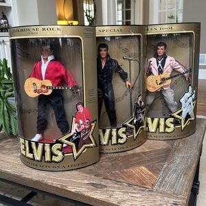 Four Vintage Elvis Presley Commemorative Dolls - pristine condition